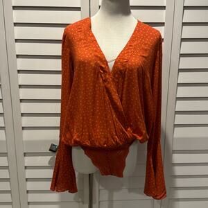 Free People Bodysuit Blouse with Bell Sleeves in Orange/ yellow dots with snaps.